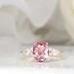 Sapphire Padparadscha with side diamond ring