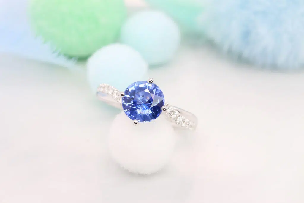 Blue Sapphire Ring Round Brilliant customised with twisted round diamond statement ring in Singapore