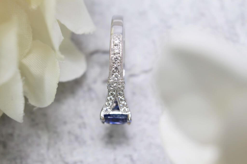 Eiffel Tower Blue Sapphire Engagement Ring - customised to eiffel tower on the band of the engagement ring with blue sapphire | Local Singapore Private Jeweller in customised wedding jewellery
