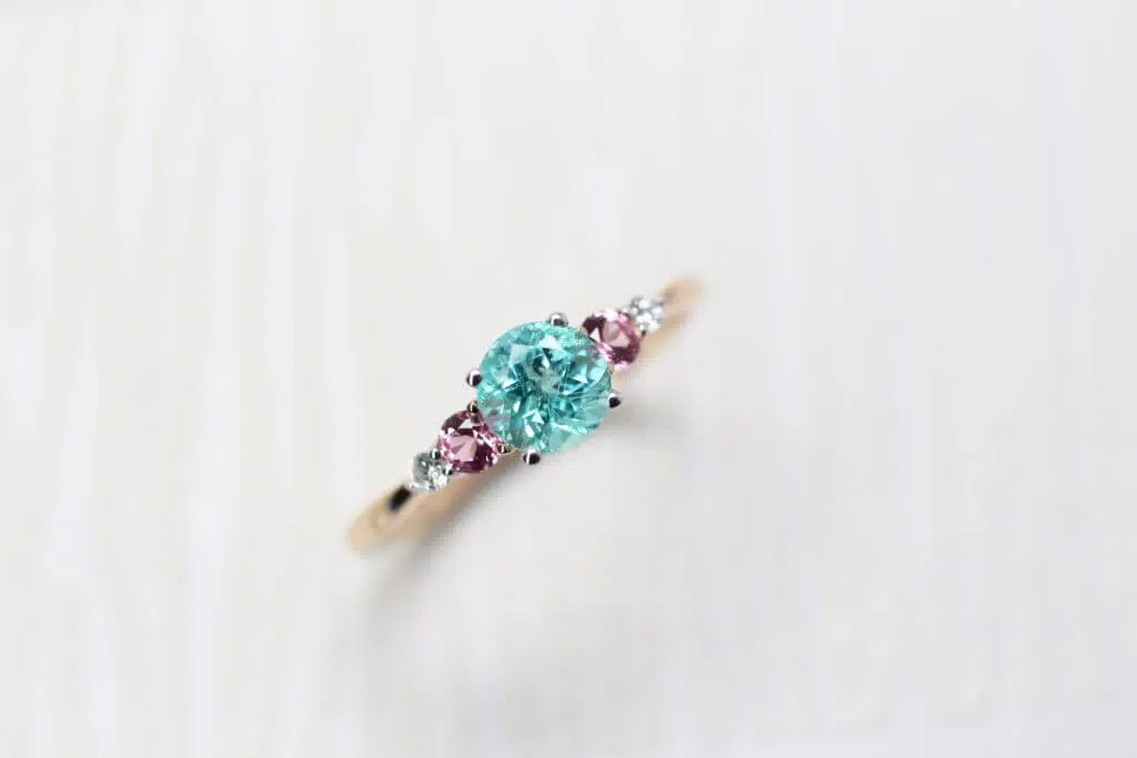 Paraiba Tourmaline Wedding Proposal Ring with rare coloured gemstone paraiba and spinel diamond. Customised wedding ring in Singapore