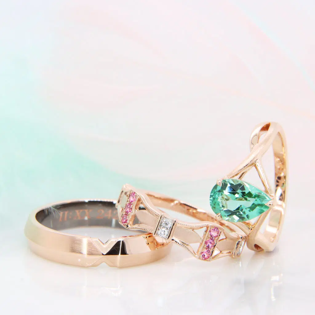 Green Tourmaline engagement ring with stackable design wedding bands