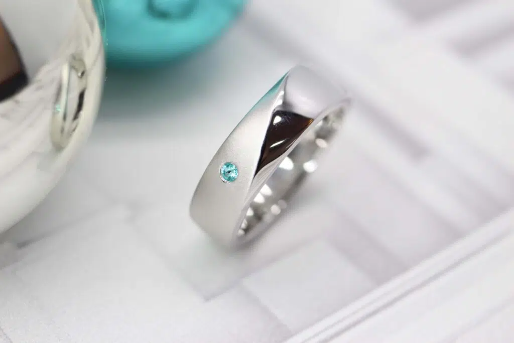 Bespoke Paraiba Tourmaline from Brazil customised in Platinum Ring as Christmas gift, Handcrafted in a glossy polished platinum ring - Customised Christmas Jewellery Gift with an extraordinary designed bespoke ring make this Christmas a unique and one-of-a-kind with Bespoke Jewellery at GIOIA Fine Jewellery Singapore