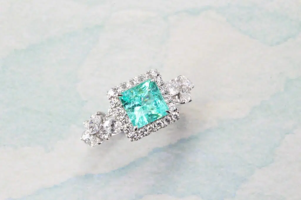Princess Cut Paraiba Ring - Paraiba Tourmaline coloured gemstone customised with Marquise Diamond Ring | Local singapore Jeweller in customised paraiba tourmaline gemstone jewellery