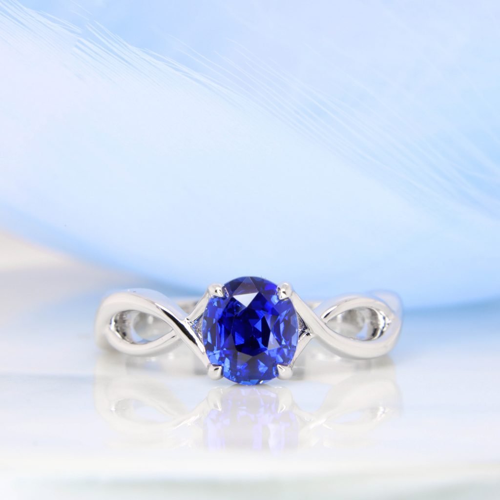 Vivid Blue Royal Blue Sapphire with twisted band engagement ring