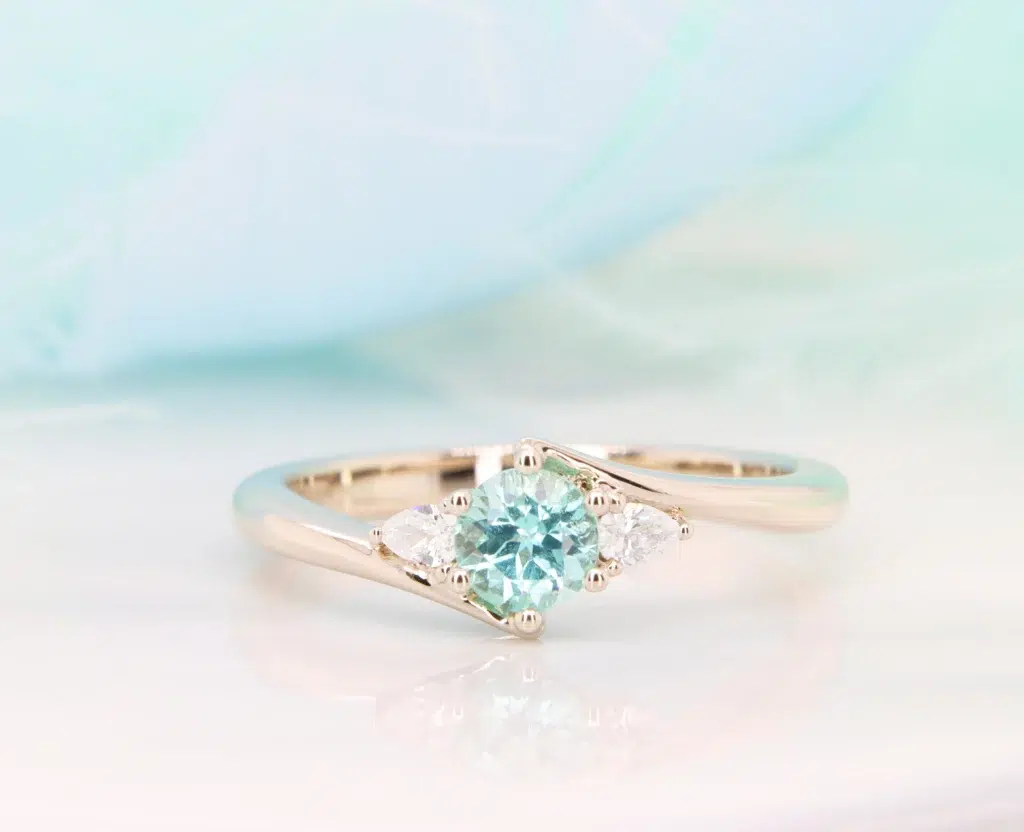 Paraiba Tourmaline Ring with side fancy diamond engagement ring
