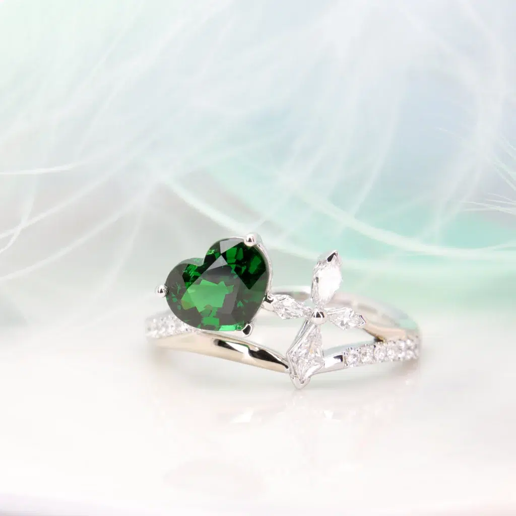 Tsavorite Garnet Heart Shape with Cross Inspiration - Unique jewellery design at GIOIA Fine Jewellery 