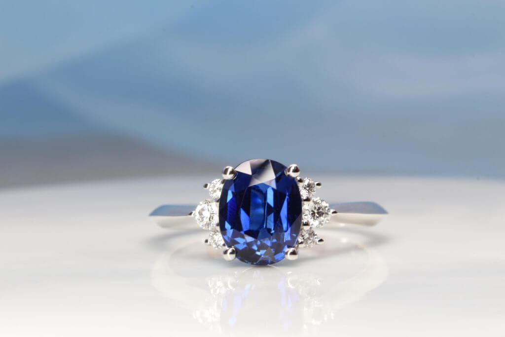 Unheated Blue Sapphire Engagement Ring customised with cluster round brilliance diamond | Custom Designed Blue Sapphire unique gemstone Proposal Ring Singapore.