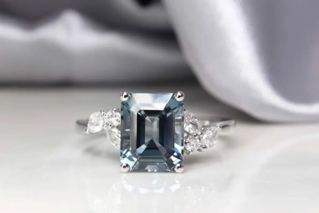 Bluish green spinel engagement ring customised for a unique wedding proposal