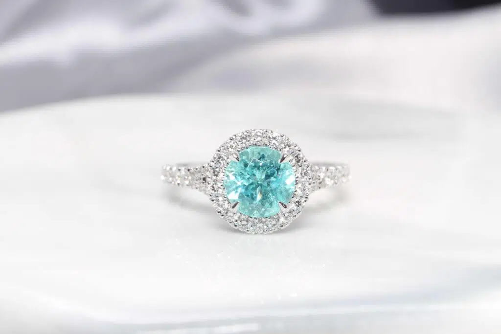 Customised Paraiba Proposal Ring - electric blue or mint green Paraiba Tourmaline Proposal Ring with diamond halo design.