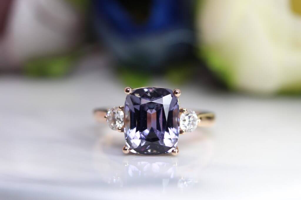 Tanzanite Unheated Engagement Ring - Custom Proposal Ring designed with Round diamonds. Bespoke Wedding Engagement Ring with Tanzanite Gemstone in Singapore.