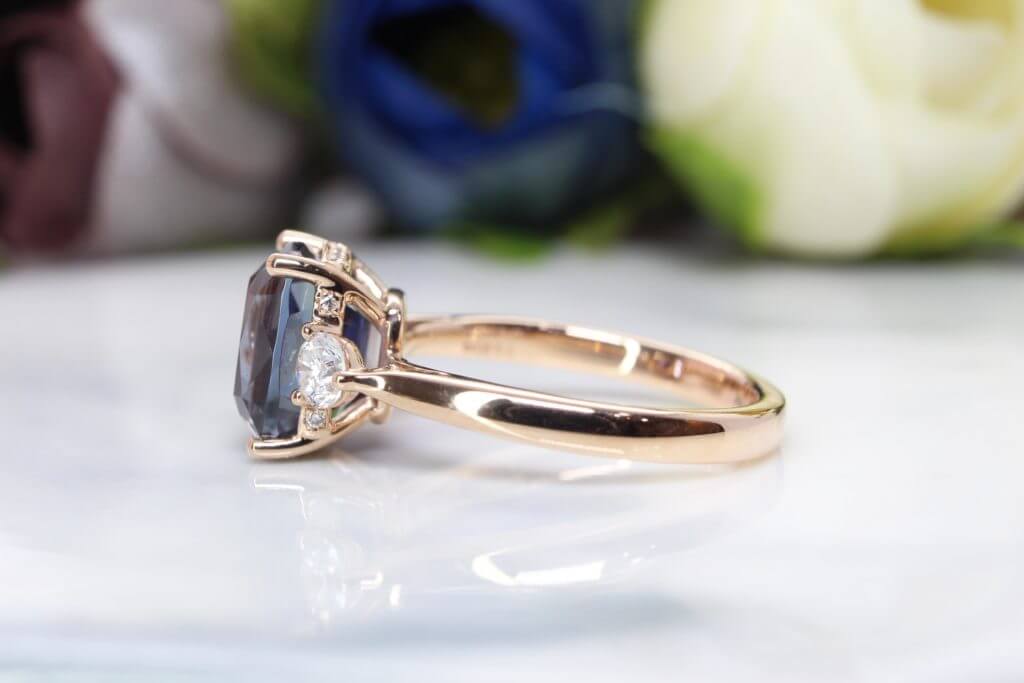 Tanzanite Unheated Engagement Ring - Custom Proposal Ring designed with Round diamonds. Bespoke Wedding Engagement Ring with Tanzanite Gemstone in Singapore.