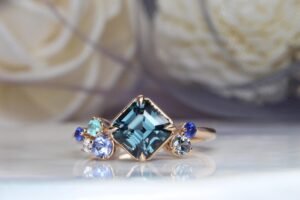 unique engagement ring custom design with gemstone blue green spinel with sapphire, paraiba tourmaline cluster gems engagement ring for unique proposal in Singapore
