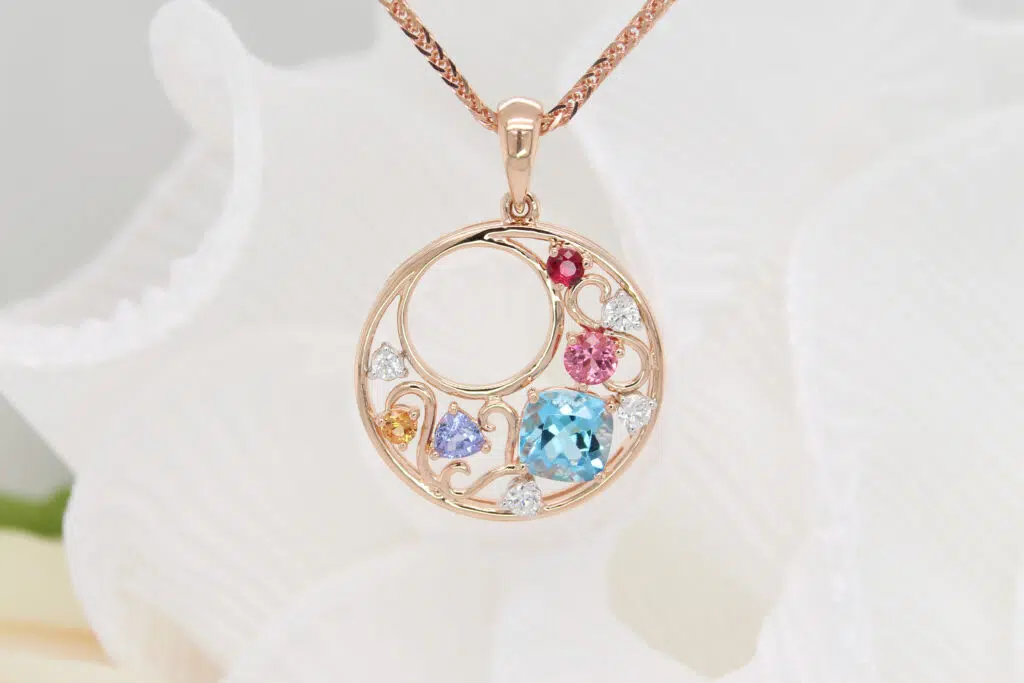 Birthstone Jewellery - Personalised pendant make a memorable gift with birthstone jewellery from ruby, mandarin garent, topaz, tanzanite and spinel 