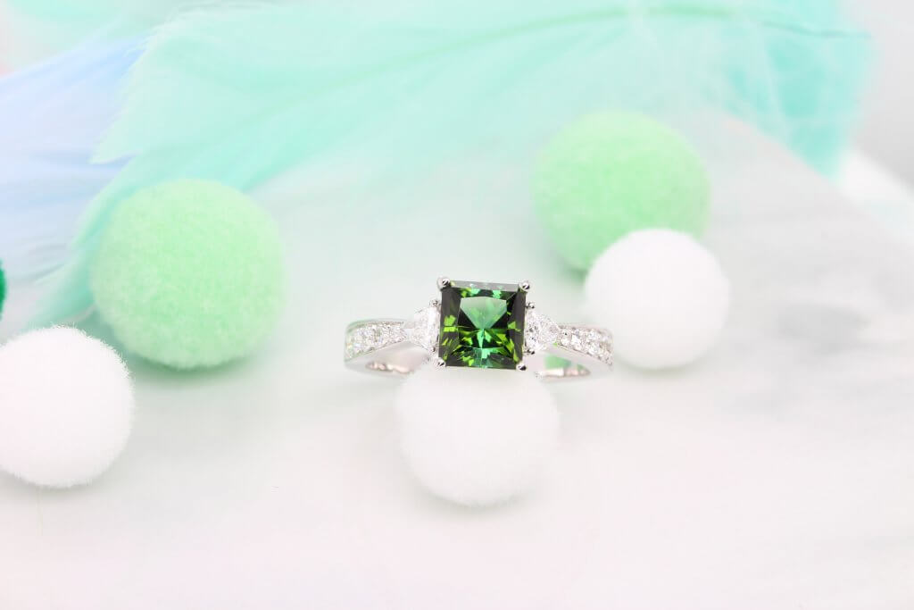 Tourmaline Proposal Ring with side Pair Trilliant Diamond. Customised Wedding Jewellery with Tourmaline Gemstone.