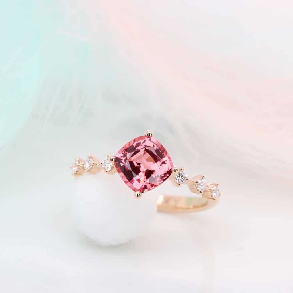Spinel Engagement Ring featuring a hot pink vivid shade spinel with spacing diamond proposal ring