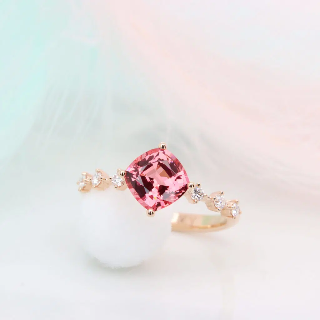 Spinel Engagement Ring featuring a hot pink vivid shade spinel with spacing diamond proposal ring 