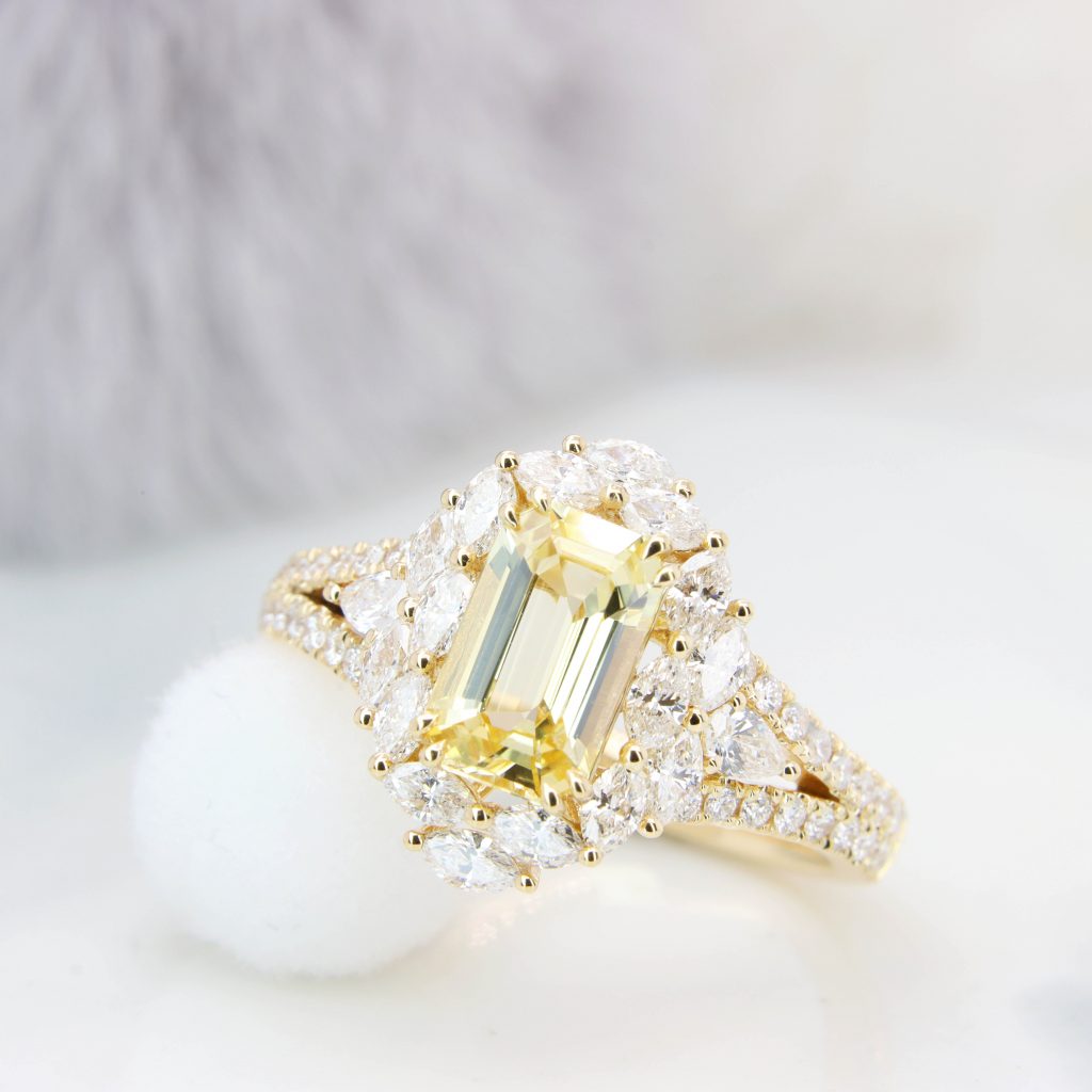 Yellow Sapphire Ring with Marquise Diamond Halo Surrounding Design in Yellow Gold