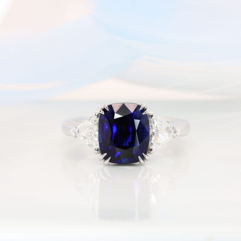 Royal Blue Sapphire Ring - Unheated deep vivid blue sapphire ring with side diamond.