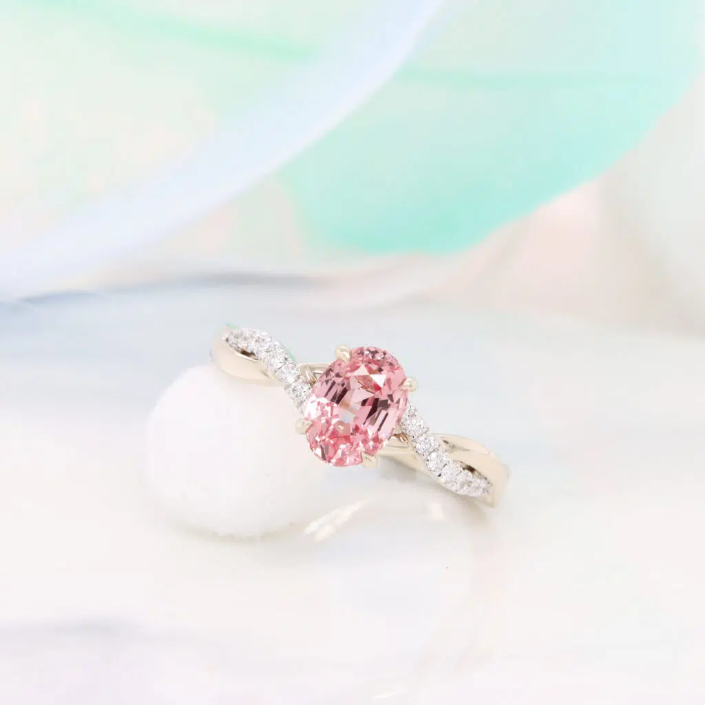 Gemstone Engagement Ring with padparadscha sapphire designed with twisted diamond ring in champagne gold