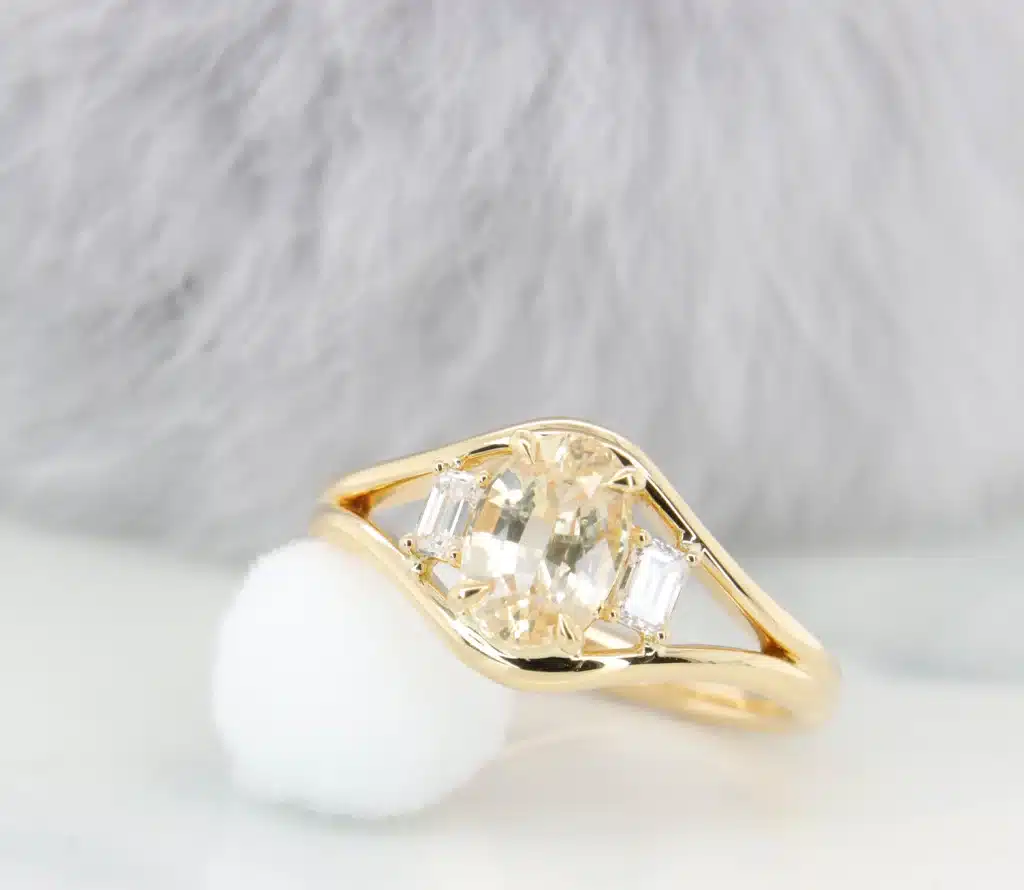 Yellow Sapphire with side emerald cut dual band ring in yellow gold in Singapore