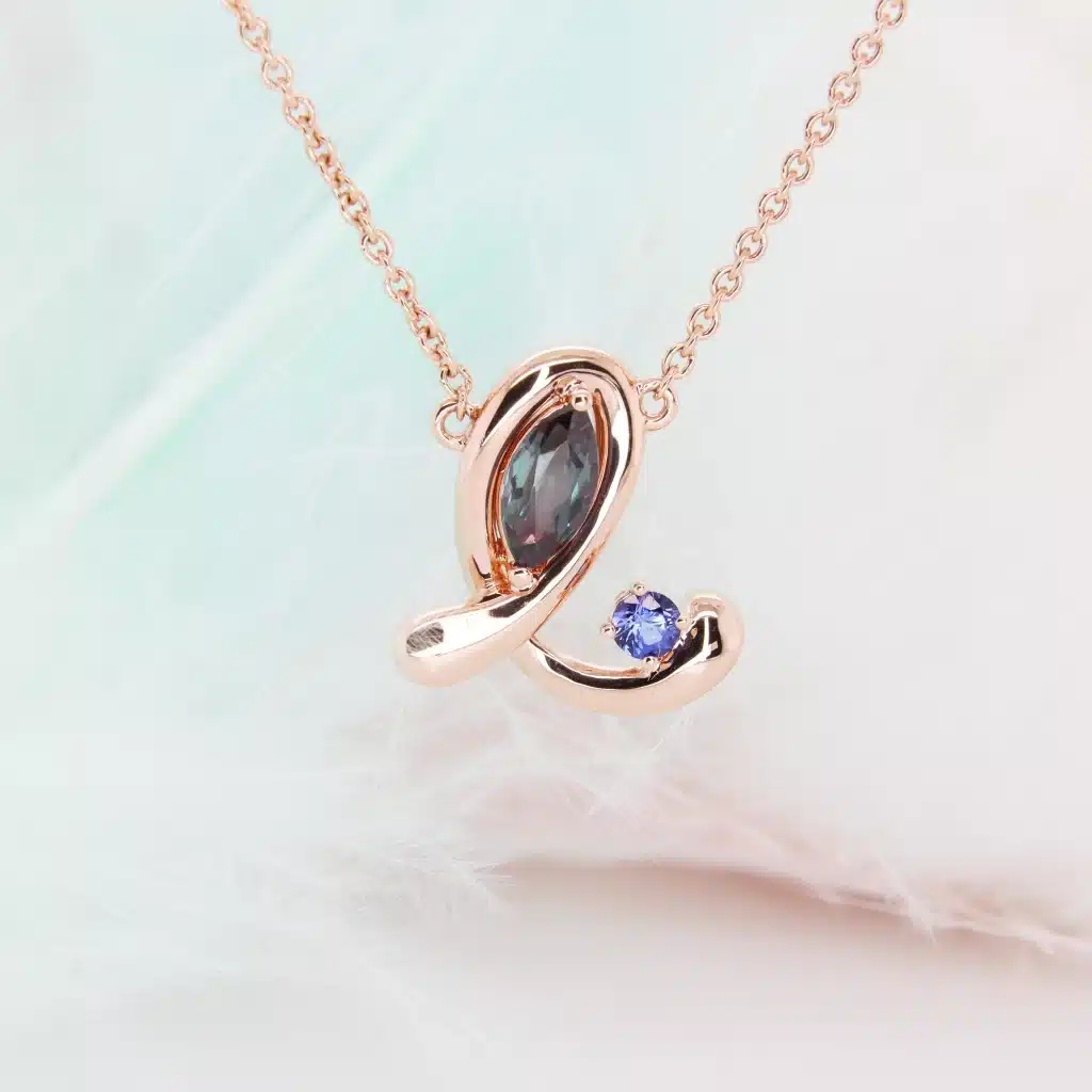 Alexandrite Gemstone with personalised initial design and birthstone sapphire necklace