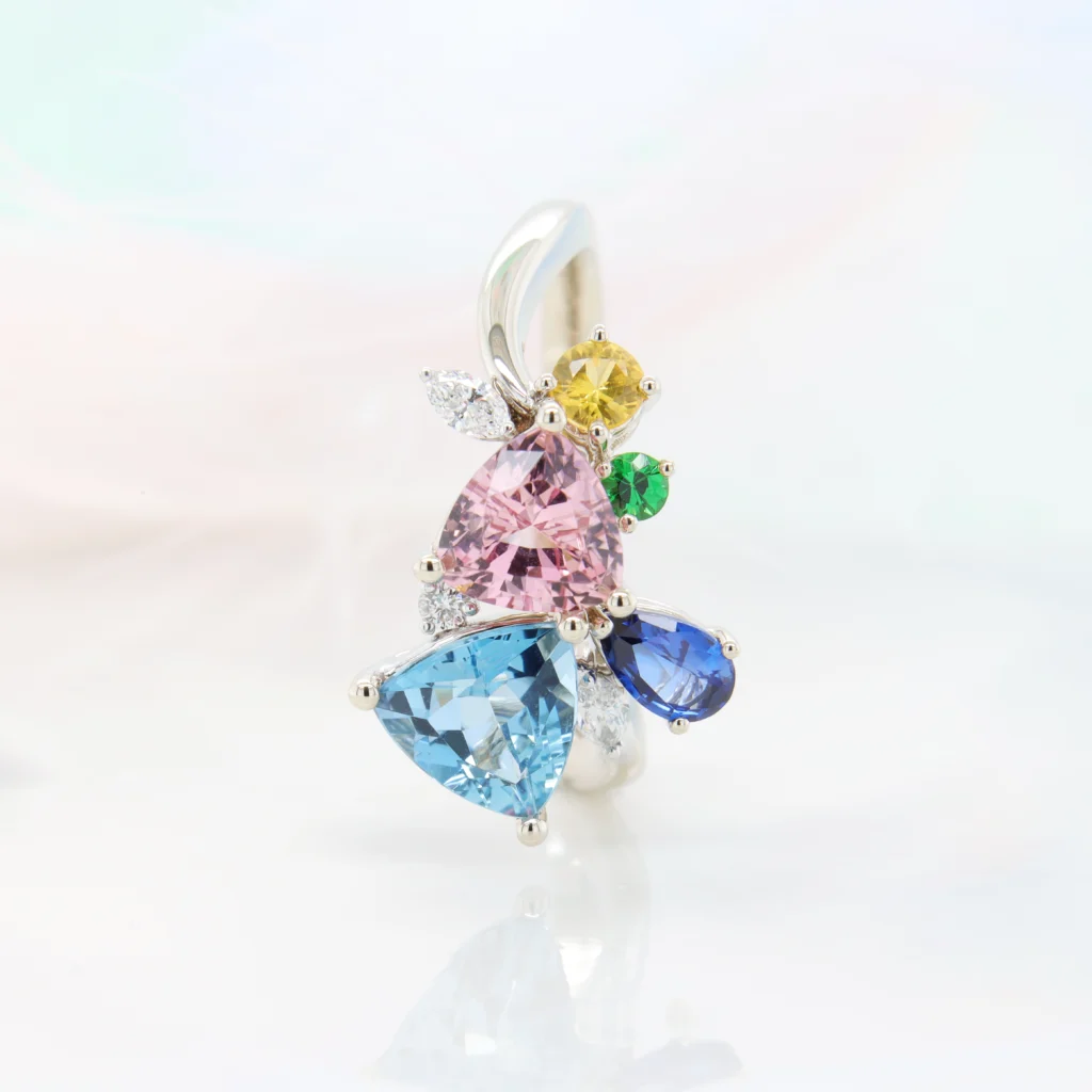 Family Birthstone Jewellery Aquamarine Pink Tourmaline Sapphire Tsavorite Citrine Ring Perspective Standview Bespoke jewellery Family Birthstone Jewellery Aquamarine Pink Tourmaline Sapphire Tsavorite Citrine Ring