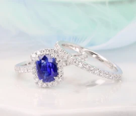 unheated blue sapphire in cornflower blue ring with diamond bands