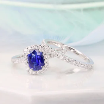 unheated blue sapphire in cornflower blue ring with diamond bands