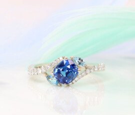 Cornflower Blue Sapphire with unique Fancy Aquamarine Curve Diamond Ring | Status: Private Commission Cornflower Blue Sapphire Customised Engagement Ring Aquamarine Side Stones