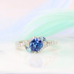 Cornflower Blue Sapphire with unique Fancy Aquamarine Curve Diamond Ring | Status: Private Commission Cornflower Blue Sapphire Customised Engagement Ring Aquamarine Side Stones