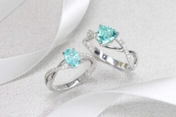 Customised Engagement Ring with Paraiba Tourmaline Gemstone with unique design for a proposal with own personalised initials on the ring | Customised Jeweller in wedding ring and wedding jewellery with paraiba tourmaline gemstone in Singapore