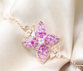 Charming floral bracelet Customised with Sapphire, this contemporary design features an elegant design secured gracefully in a classic chain. | Local Singapore Jeweller in Bespoke Customised fine Jewellery.