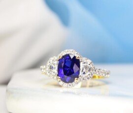 Royal Blue Sapphire with halfmoon and halo diamond ring