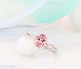 Padparadscha Sapphire est 1.0ct Oval Shape Unheated | Status: Private Commission Engagement Ring with padparadscha sapphire designed with twisted diamond ring in champagne gold