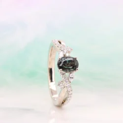 0.92ct Brazil Alexandrite Oval | Bluish Green (Fluorescent Light) | Vintage Art Deco Alexandrite Colour Change Custom Proposal Ring in Champagne Gold Perspective Bluish Green in Singapore by GIOIA Fine Jewellery