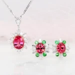 Mahenge Pink Spinel Ballerina Pendant & Earring Stud with Green Tsavorite Custom Mahenge Pink Spinel Ballerina Pendant & Earring Stud with Green Tsavorite Bespoke Jewellery