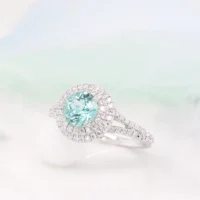 Round Blue Green Tourmaline double halo diamond ring Perspective view