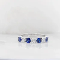 Vivid blue sapphire diamond eternity band for everyday wear, alternating sapphires and diamonds in white gold, GIOIA Singapore